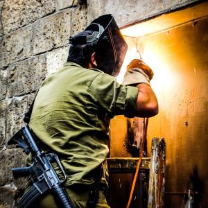 Israeli military welds shut the home of Aamal Hashem Dundes.